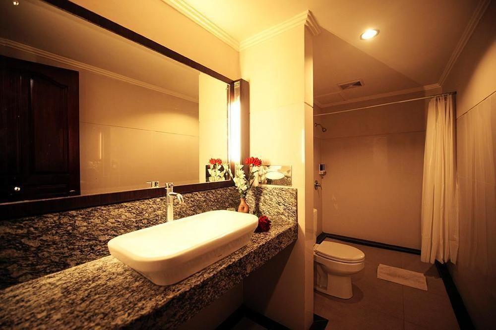 Urbanview Hotel Taman Suci Denpasar Chambre photo